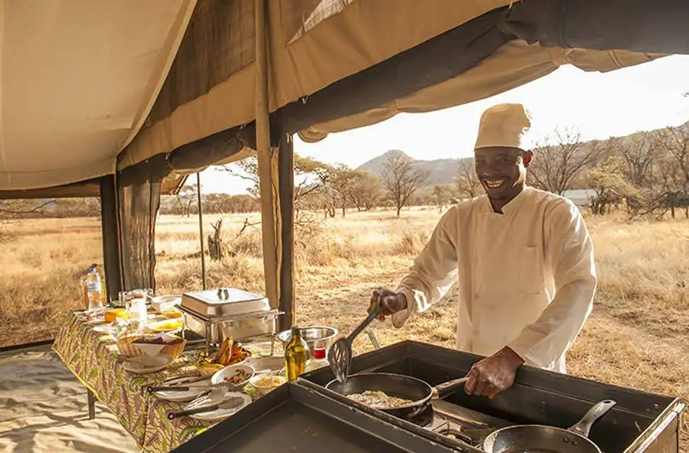Safari in Tanzania 7 Serengeti Tented Camp - Chef making food