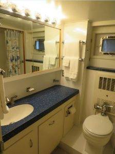 Basin and toilet inside a boat