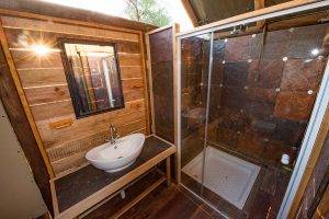 Wild Africa 11 Eco Safari in South Africa - Tented Camp -Bathroom showing shower and basin