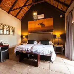 Luxury Safari Lodge - Room with two single beds together.