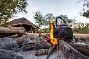 Pungwe Camp fire with kettle boiling - Pungwe Bush Camp Photo Safari